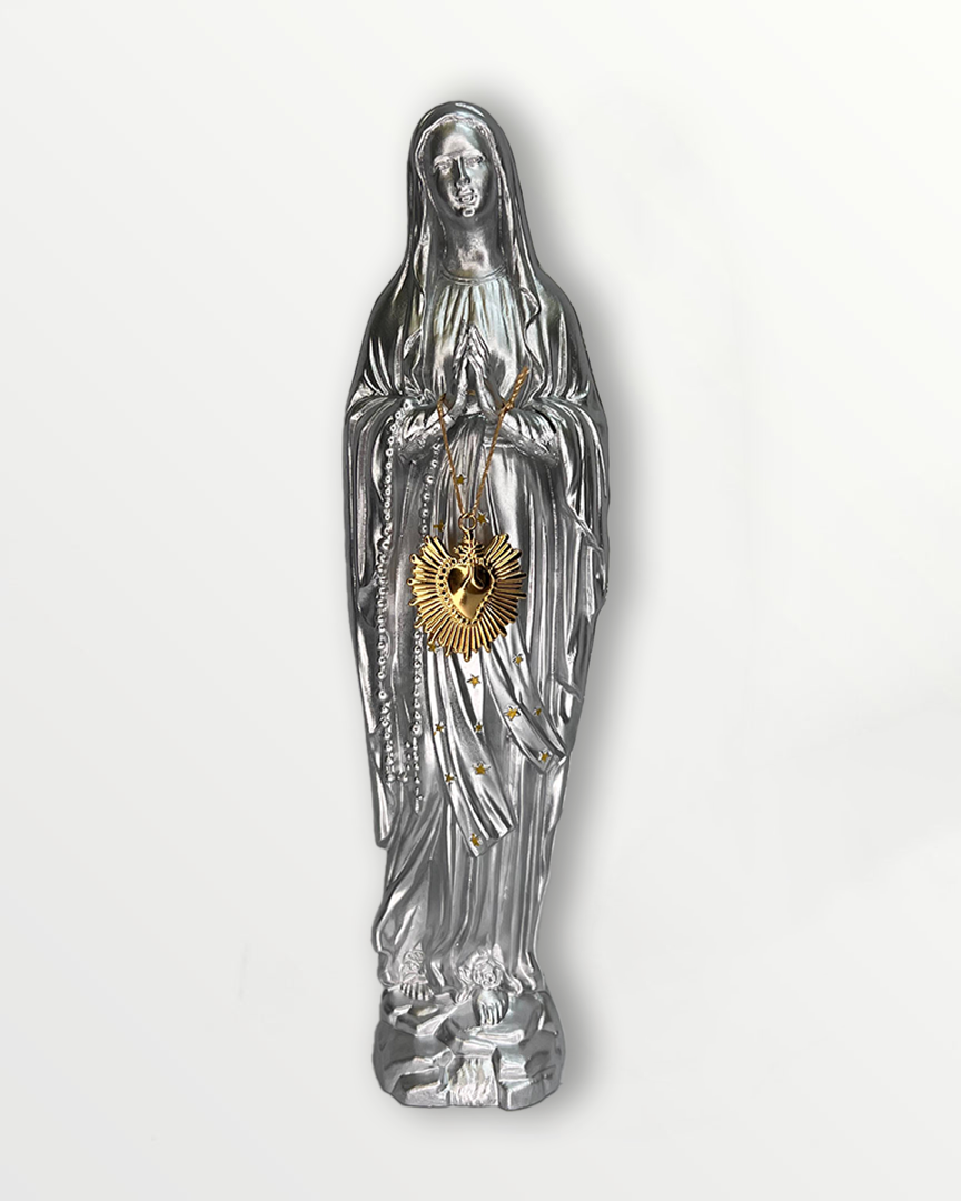 Statuette de la Vierge ex-voto