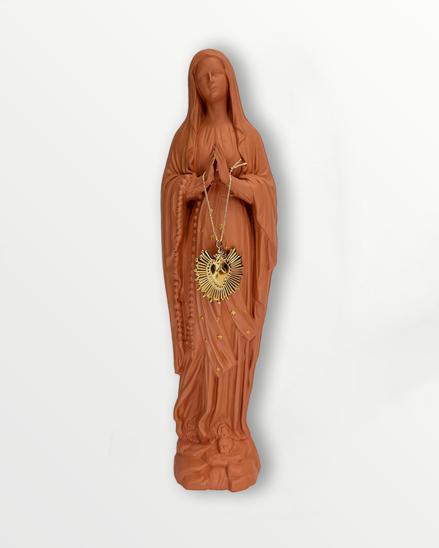 Statuette de la Vierge ex-voto